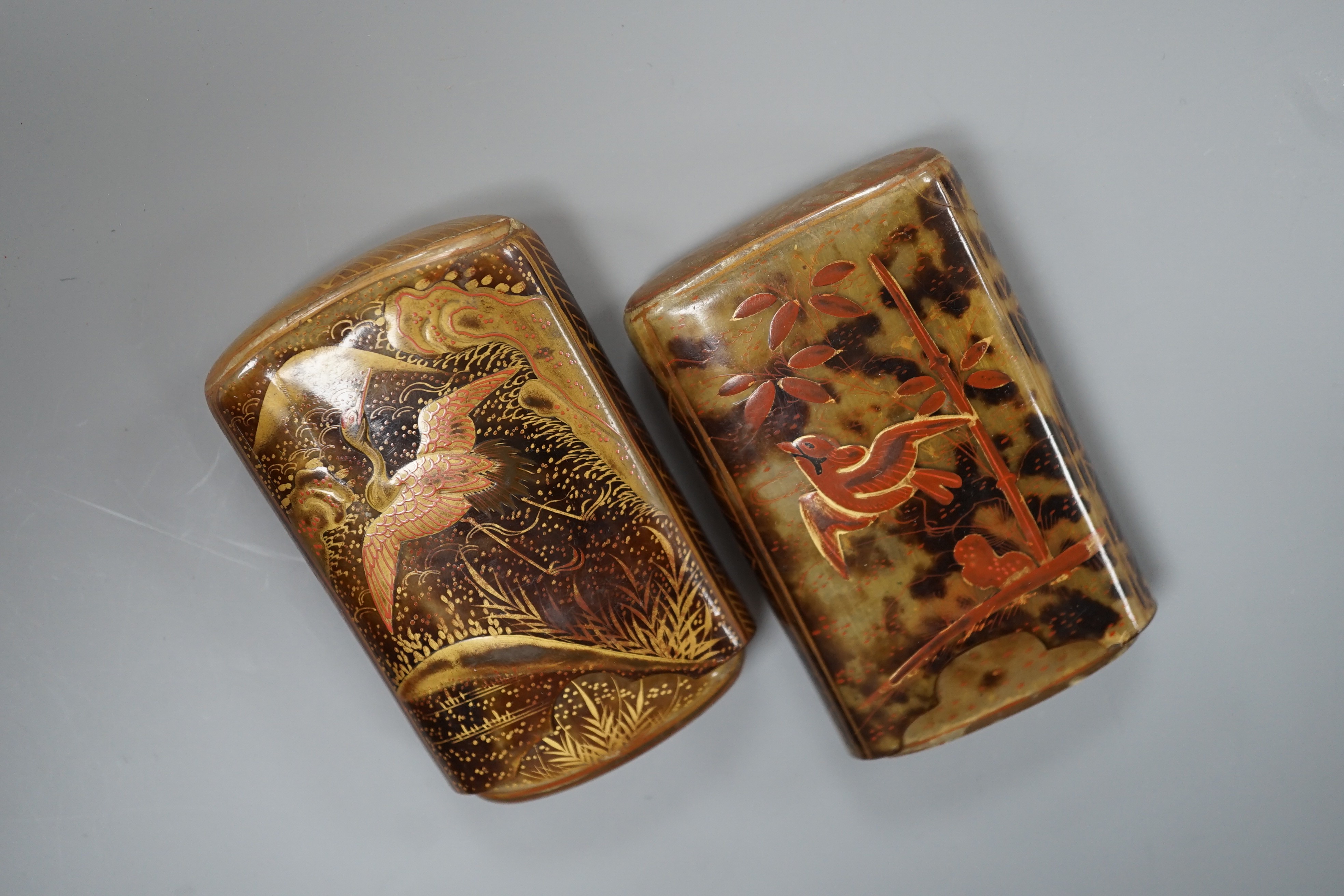 Two Japanese gilt lacquered tortoiseshell cigarette cases, 8 cm